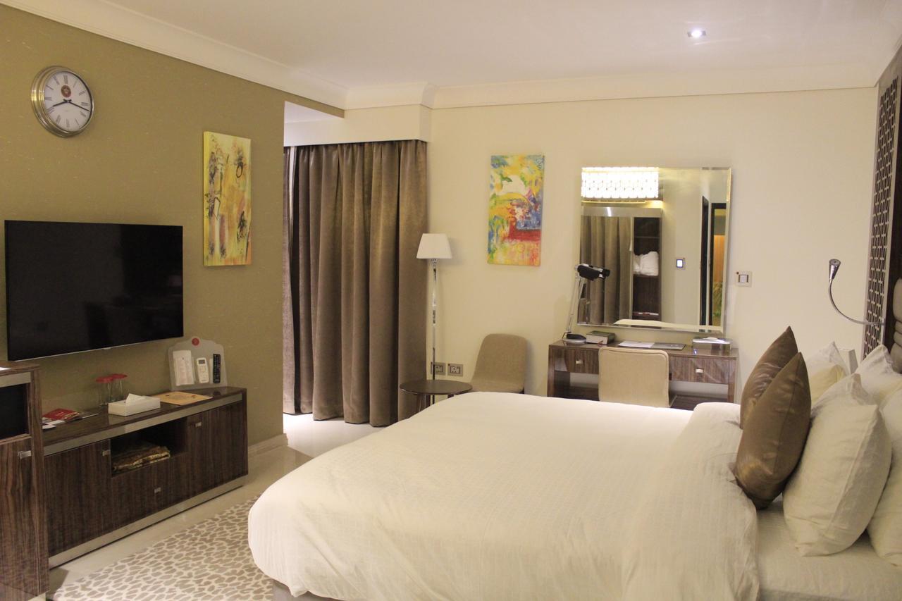 Tio Sea Resort Al Khawr Bagian luar foto A bedroom at the hotel